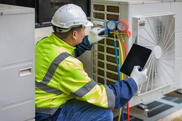 Professional Hvac technician working in Ellisville, MS